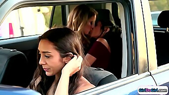 Enjoy Watching Two Girls Kiss Passionately In The Backseat